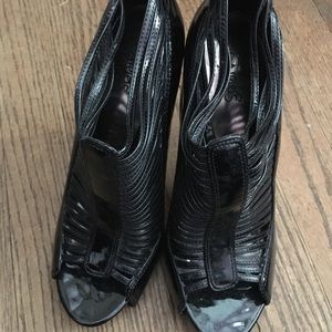 Carlos Santana strapped stiletto